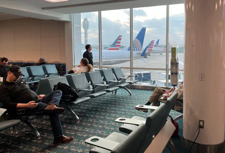 People waiting at an airport.