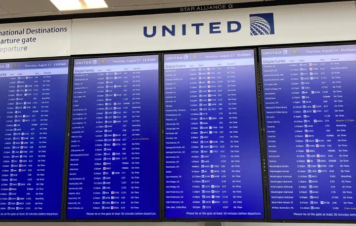Departures screen at an airport.