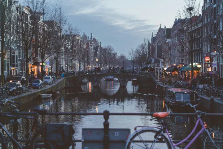 Buildings, bridge, canal in Amsterdam.